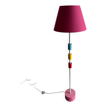 Vintage IKEA floor lamp in white metal with pink fabric shade and colorful accents