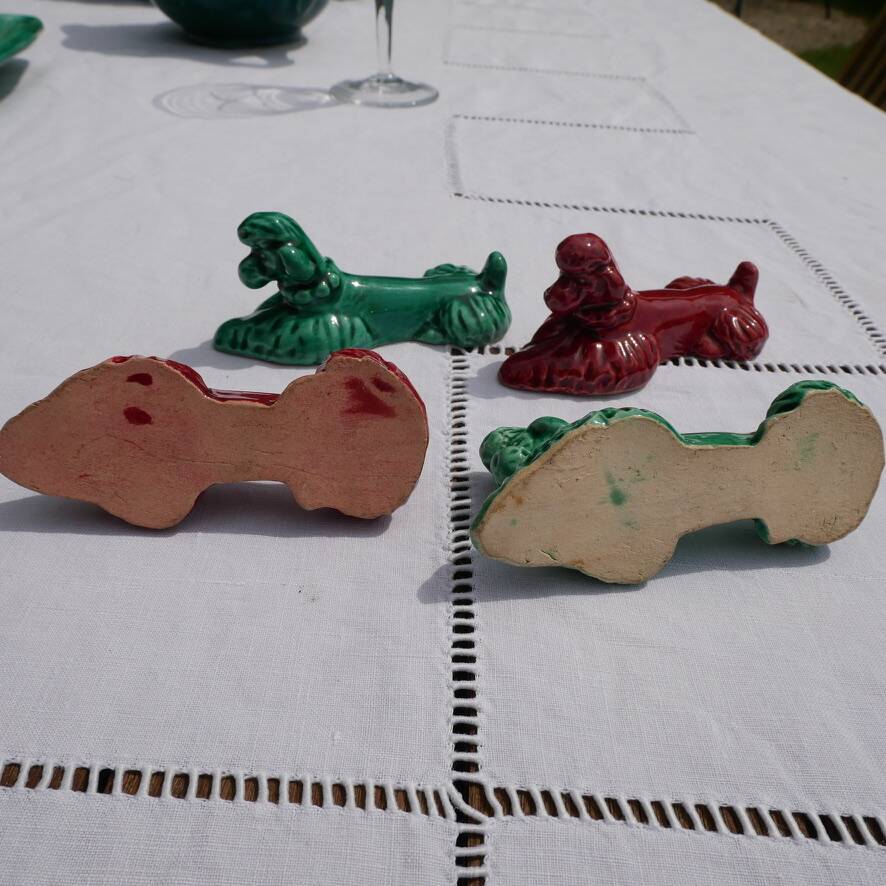 4 knife holders in the shape of poodles