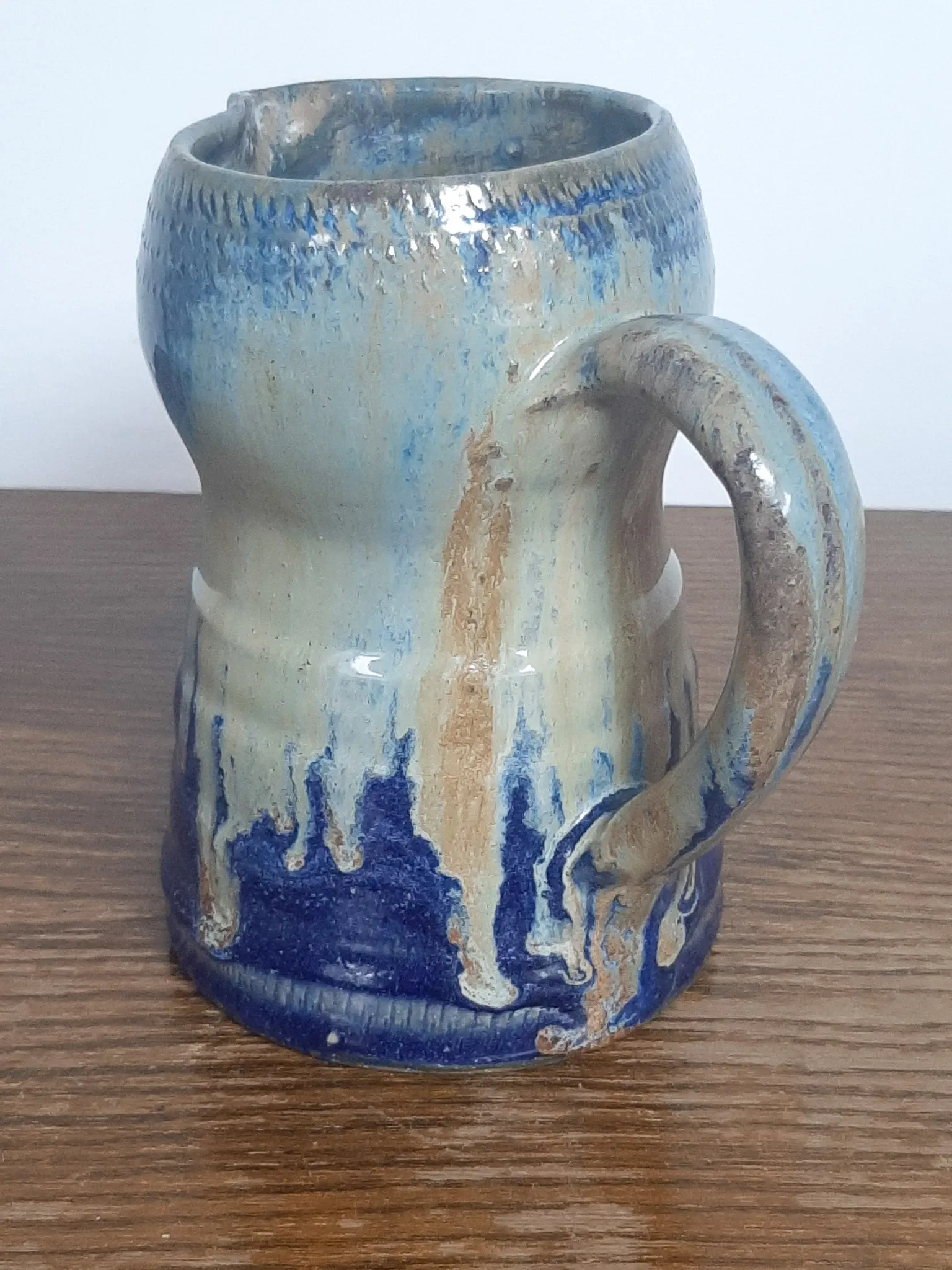 Blue flamed stoneware jug
