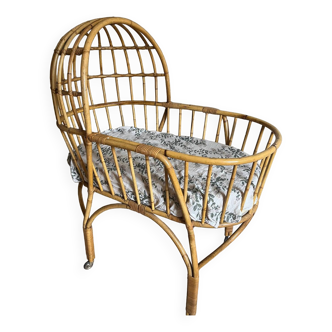 Old rattan cradle