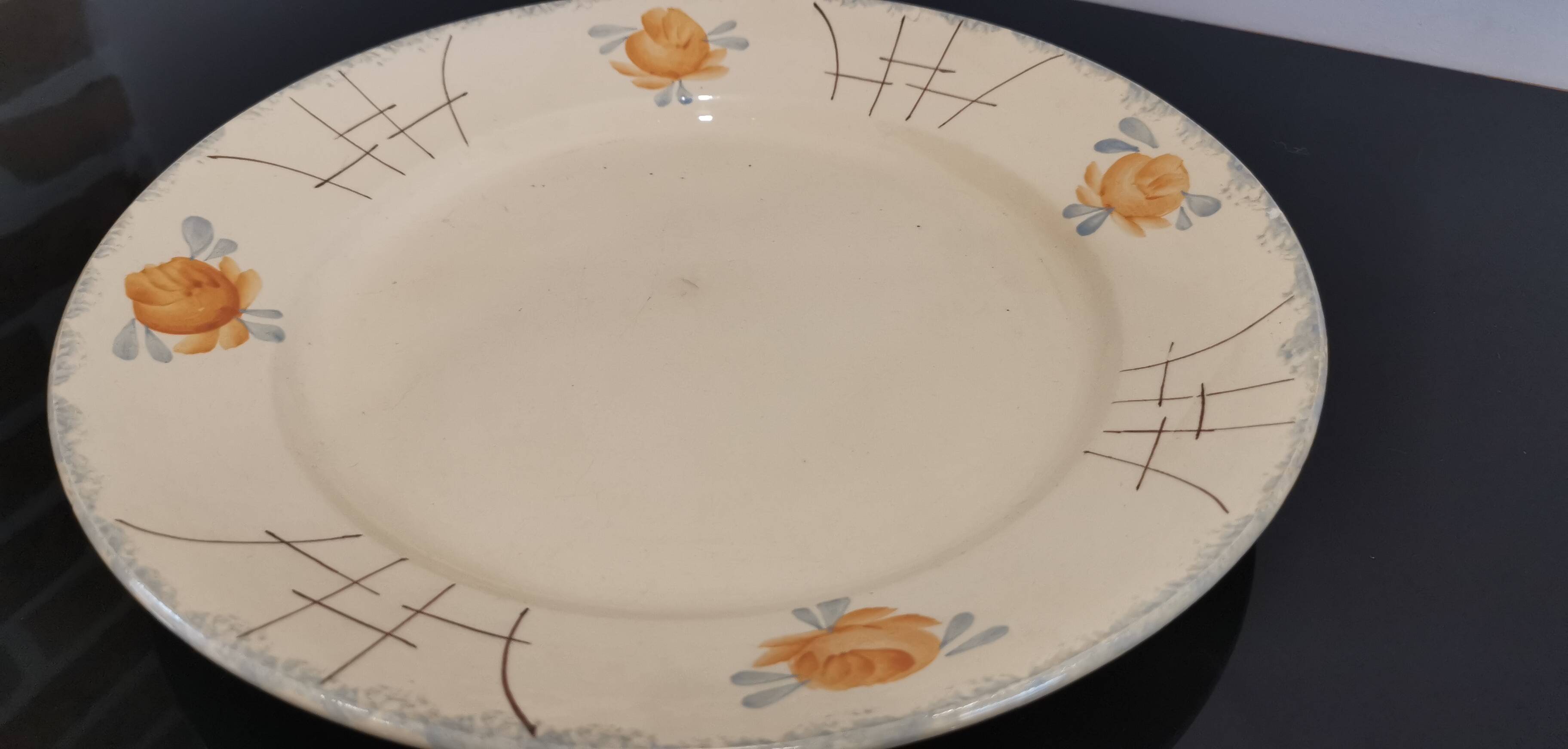 Old Terre de fer earthenware dish, hand painted