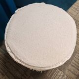 Wood and fabric pouf stool.