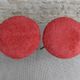 Pair of tripod stools, with tapered wooden feet and moumoute seat