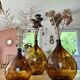 Lot de 3 dame-jeanne ambrées