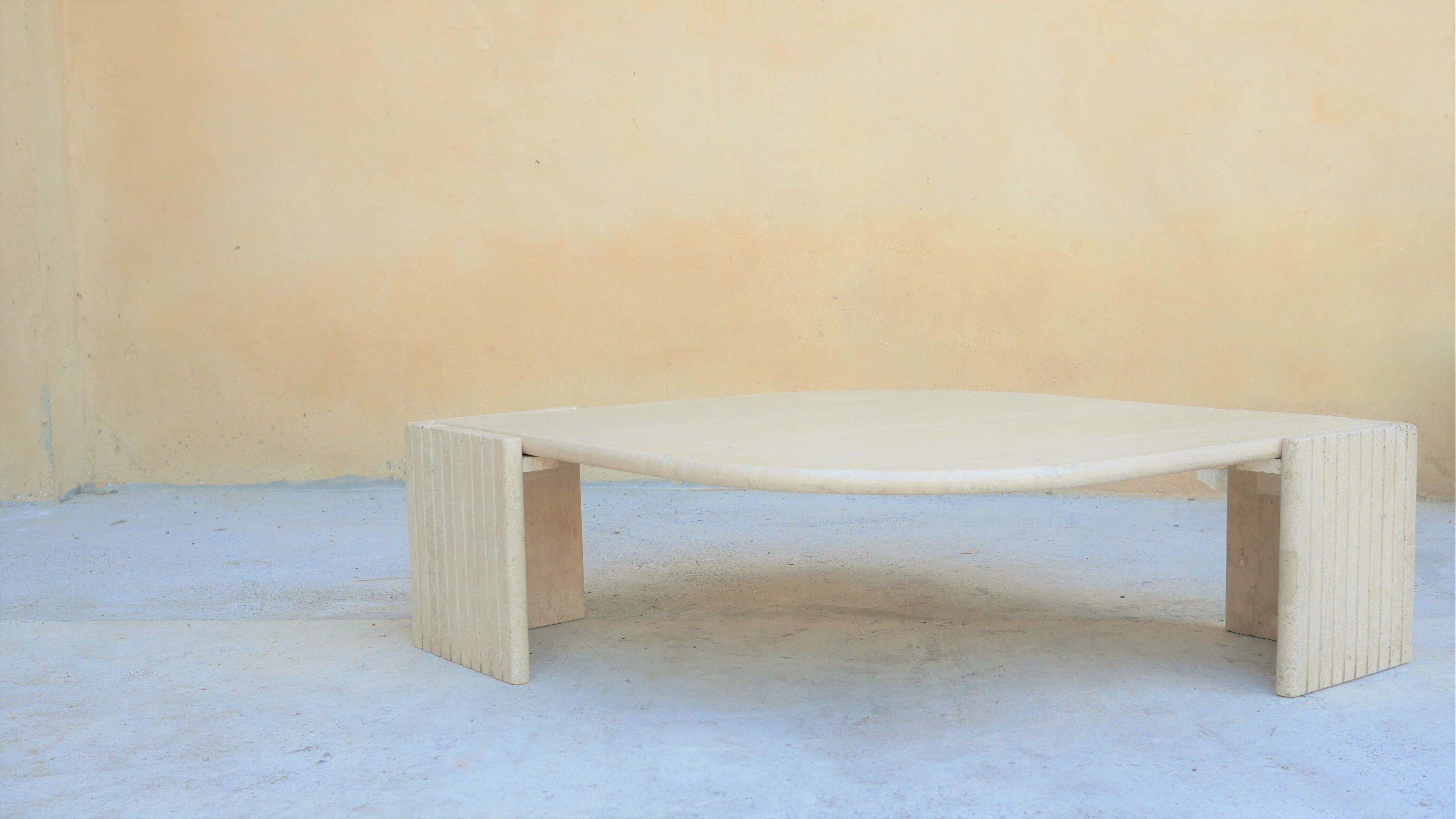 Coffee table in travertine by Roche Bobois editions