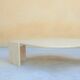 Coffee table in travertine by Roche Bobois editions