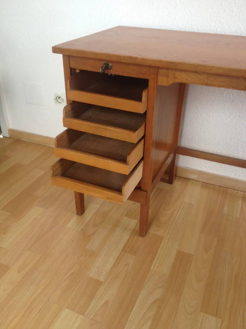 Vintage 1950s oak desk with sliding curtain.