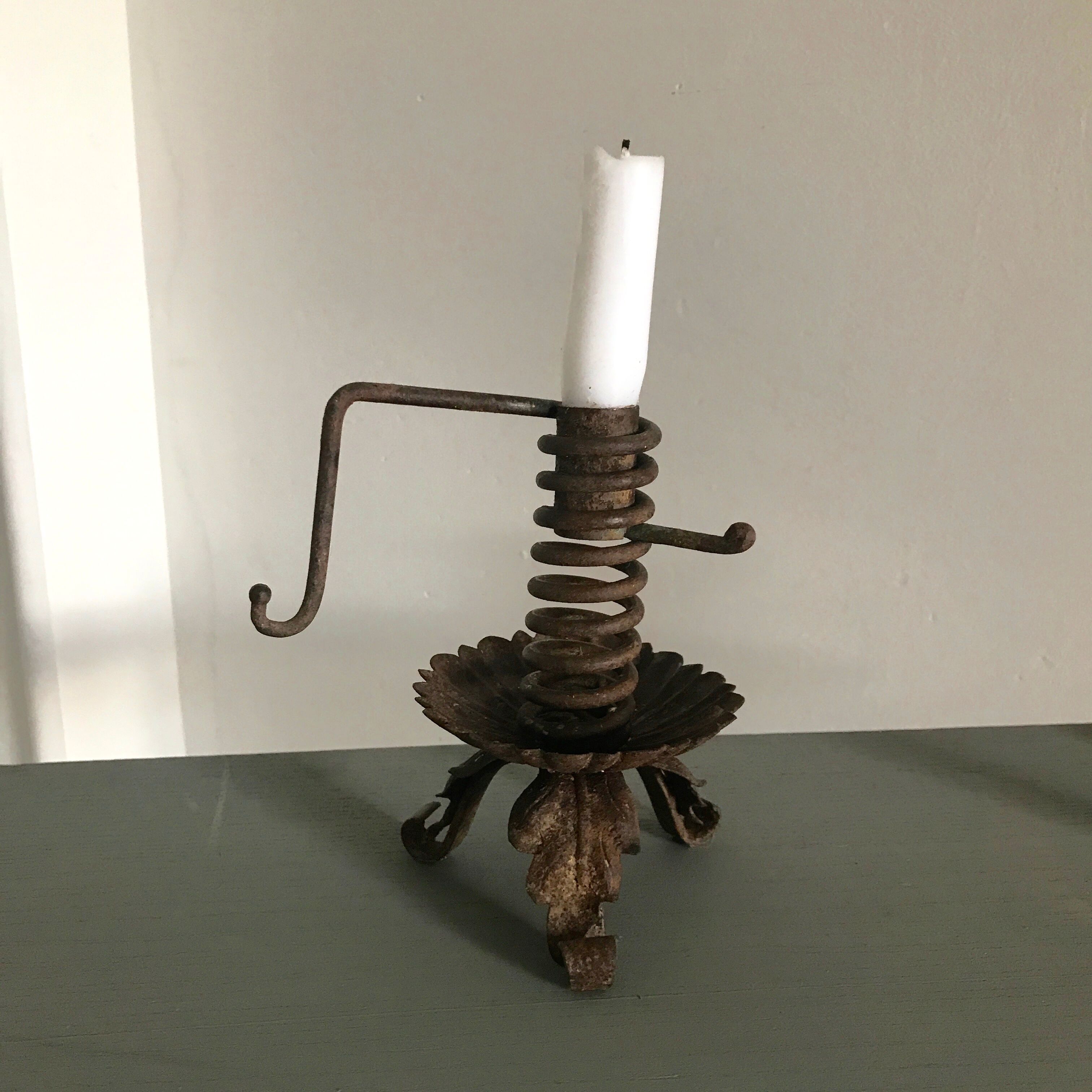 Ancient metal candlestick