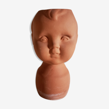 Terracotta pot cover baby head