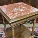 Henri II gueridon in walnut with marble top, early 20th century.