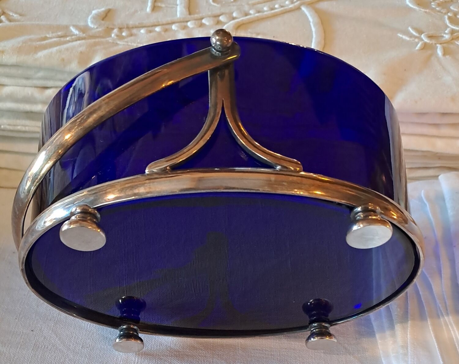 Silver-plated metal and blue glass biscuit jar