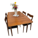 Extendable teak dining table