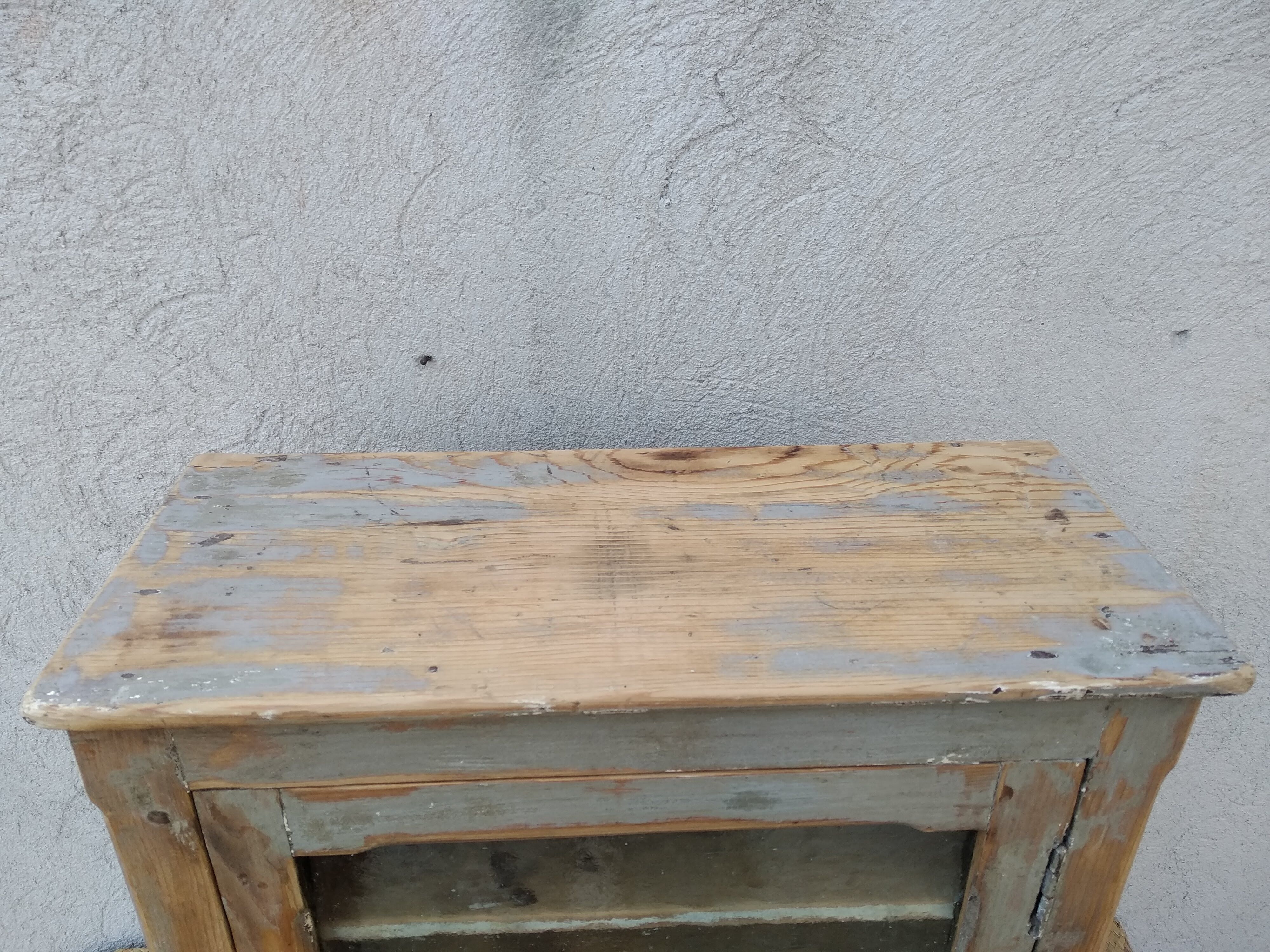 Antique wooden bathroom cabinet patinated