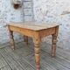 Small antique farmhouse table in solid pine.