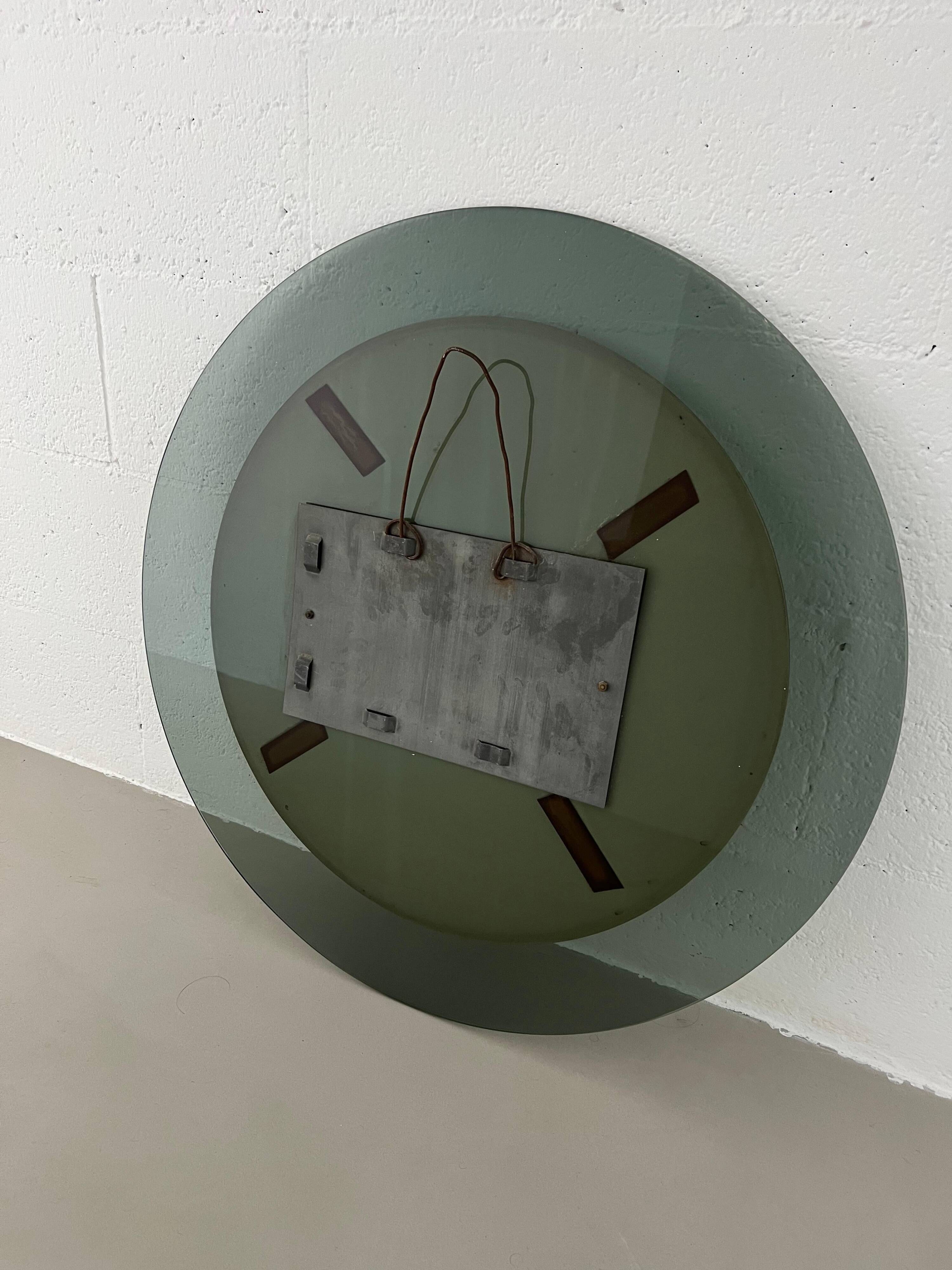 Decorative round wall mirror in smoked glass, Space Age Italian collectible