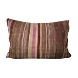 Cushion cover in an old Berber blanket.