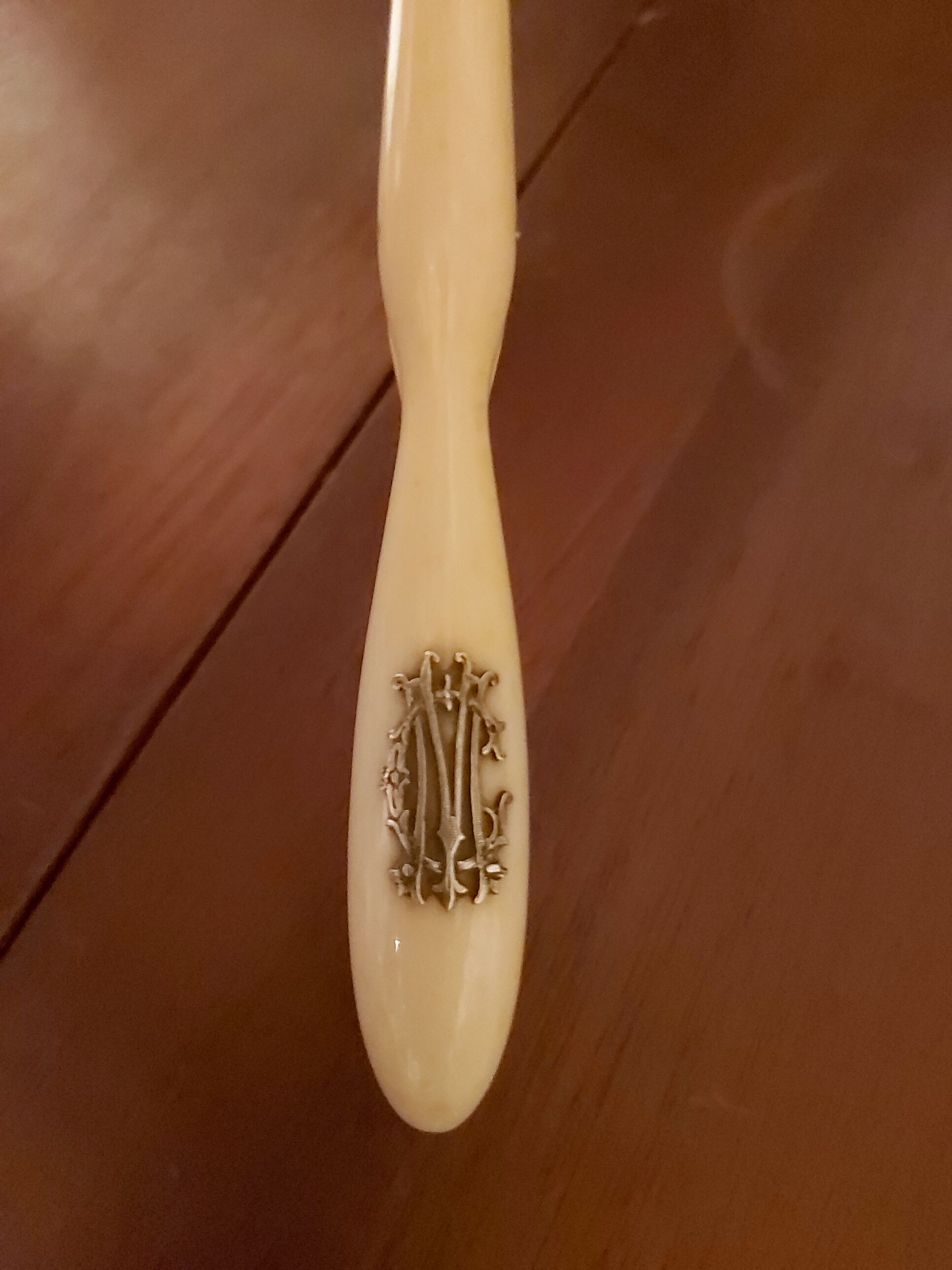 Ivory and silver glove clips