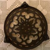 Vintage enameled cast iron trivet