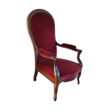 Red voltaire armchair