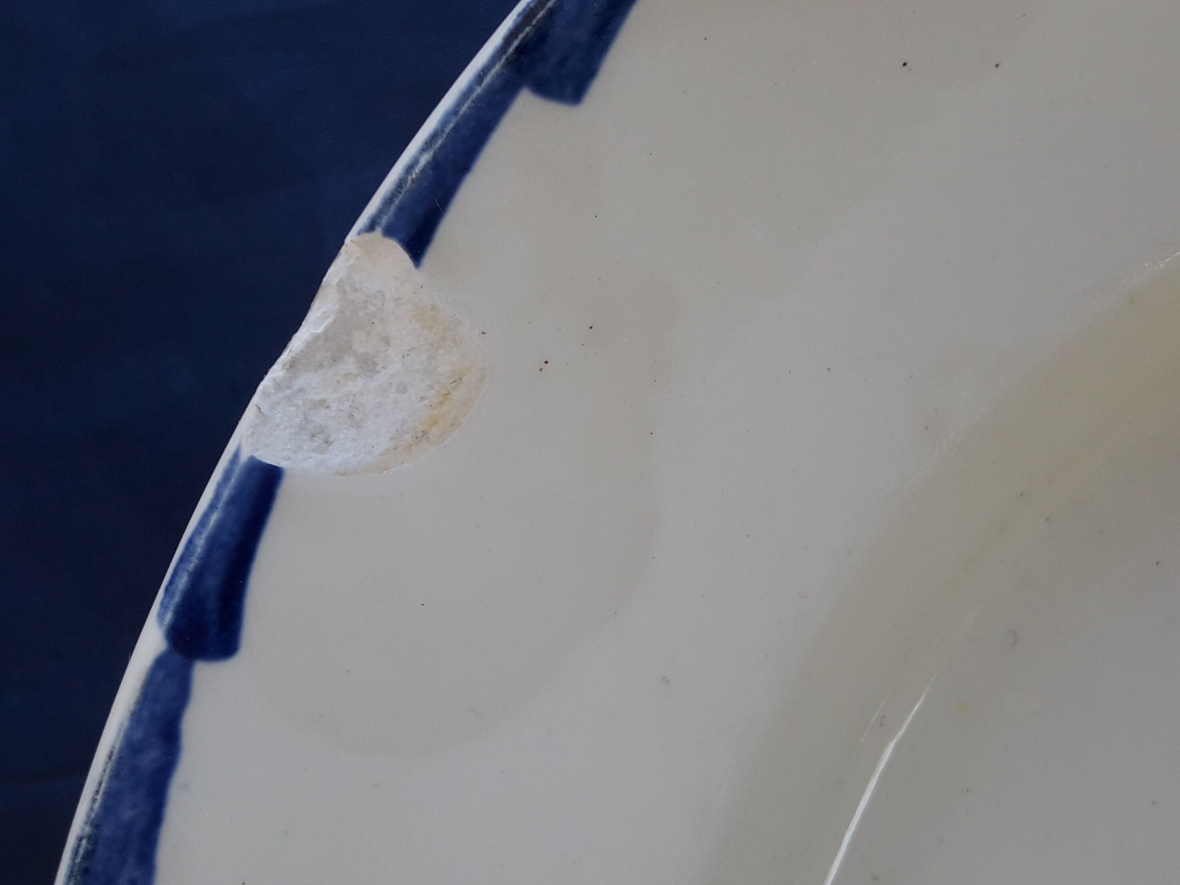 Oval flat in earthenware of Saint Amand numbered 3082 L 32 cm