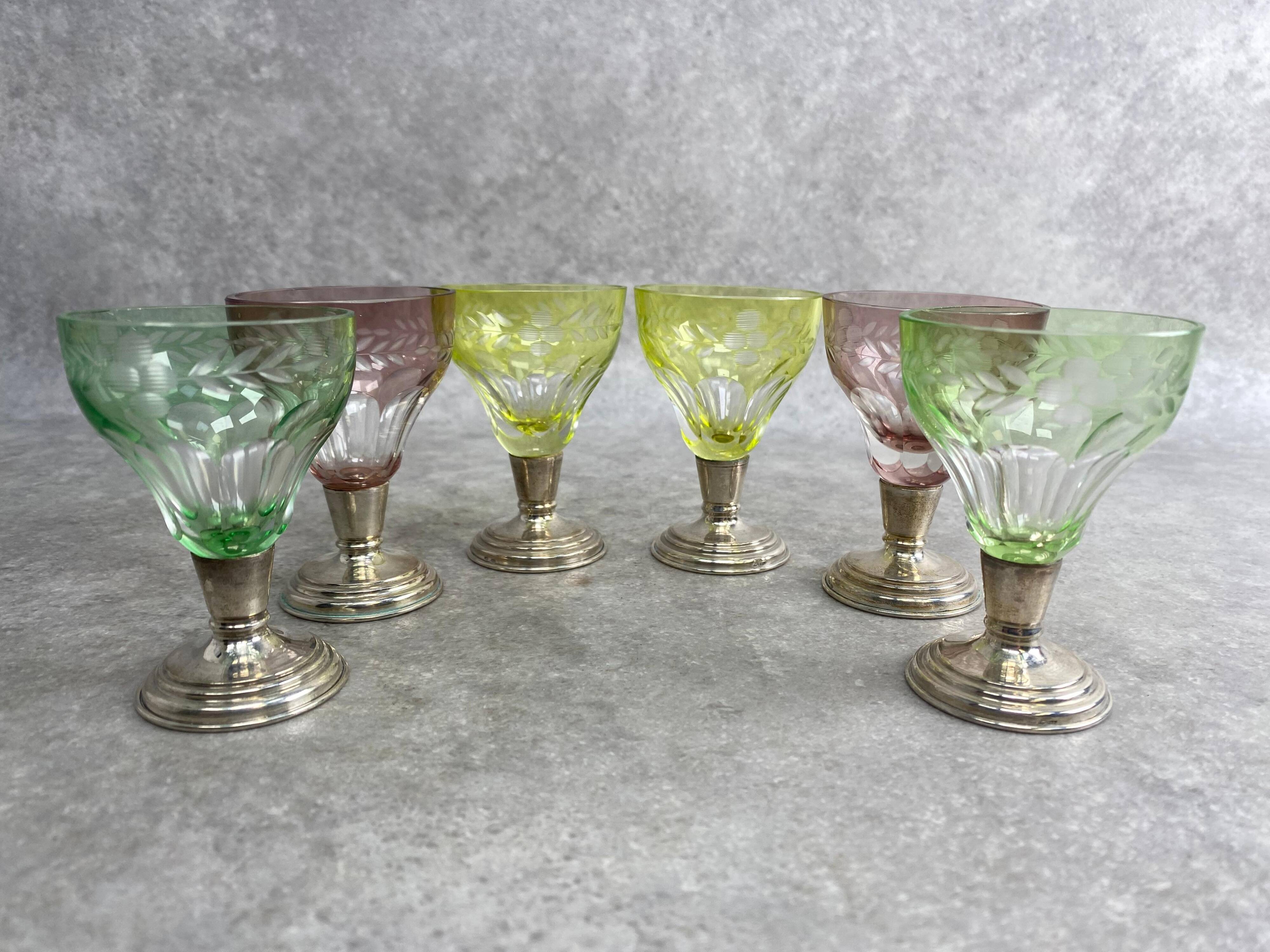 Set of 6 coloured stemmed glasses on silver stems.