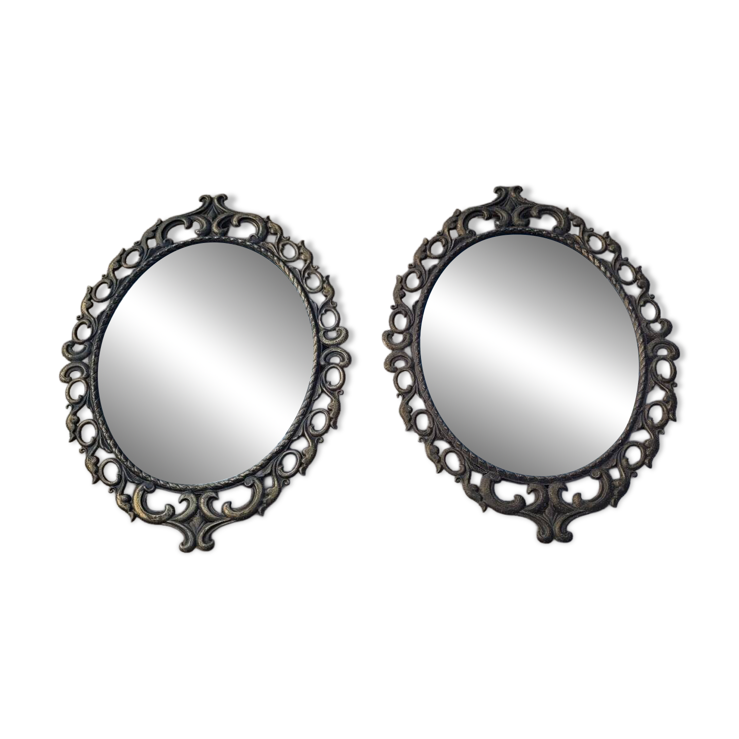 2 antique oval mirrors in heavy metal