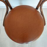 Thonet armchair, swivel, in wood and faux leather.