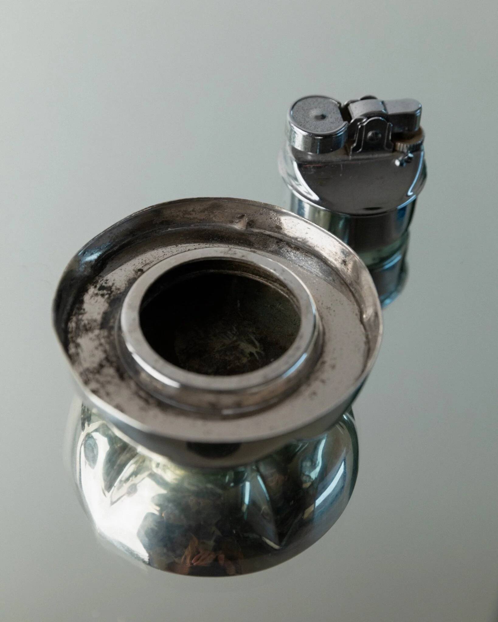 Silver-plated vintage Christian Dior Pumpkin set: two lidded metal bowls with removable integrated lighter, 1970s