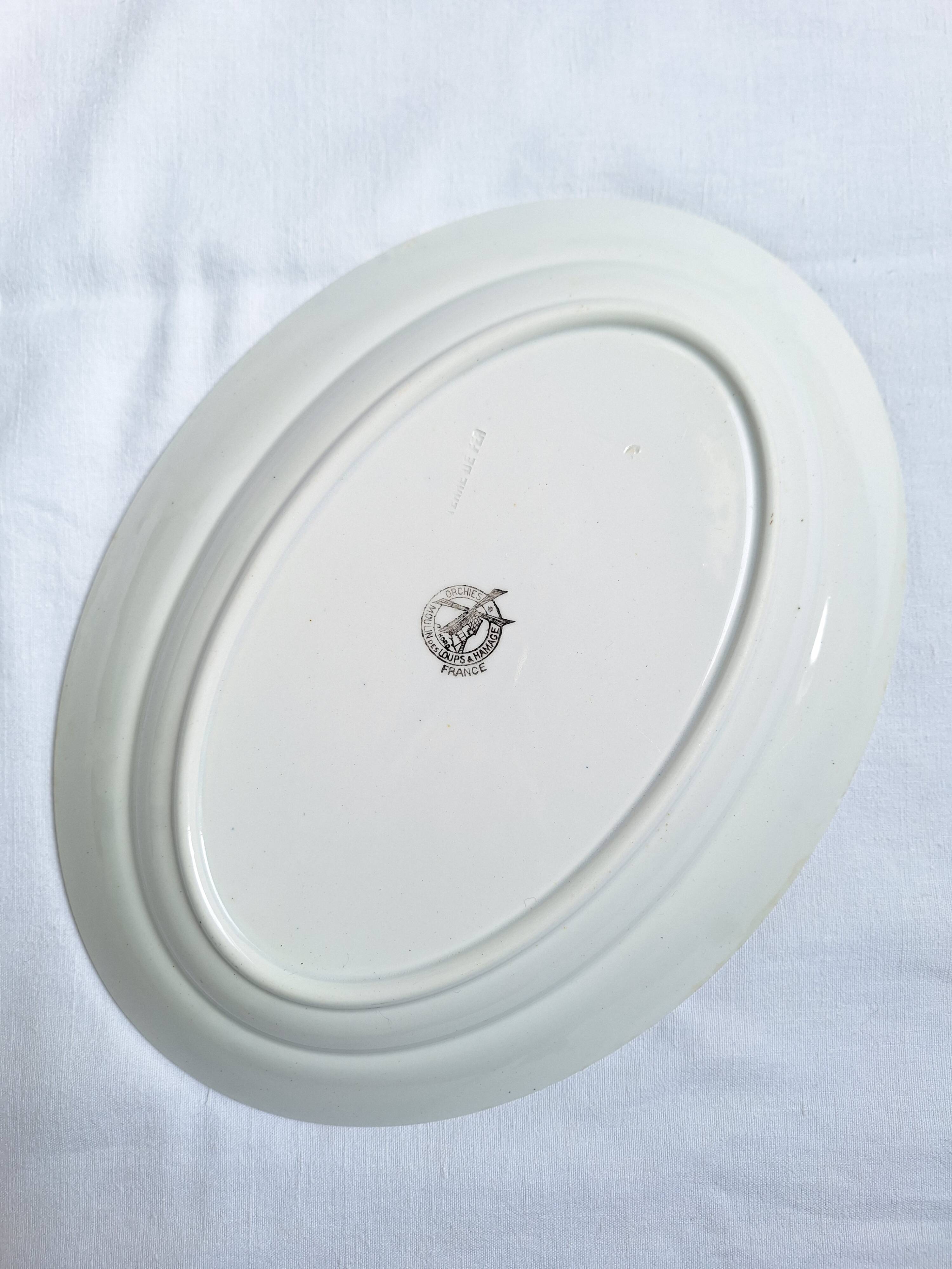 Green oval shallow dish Moulin des Loups