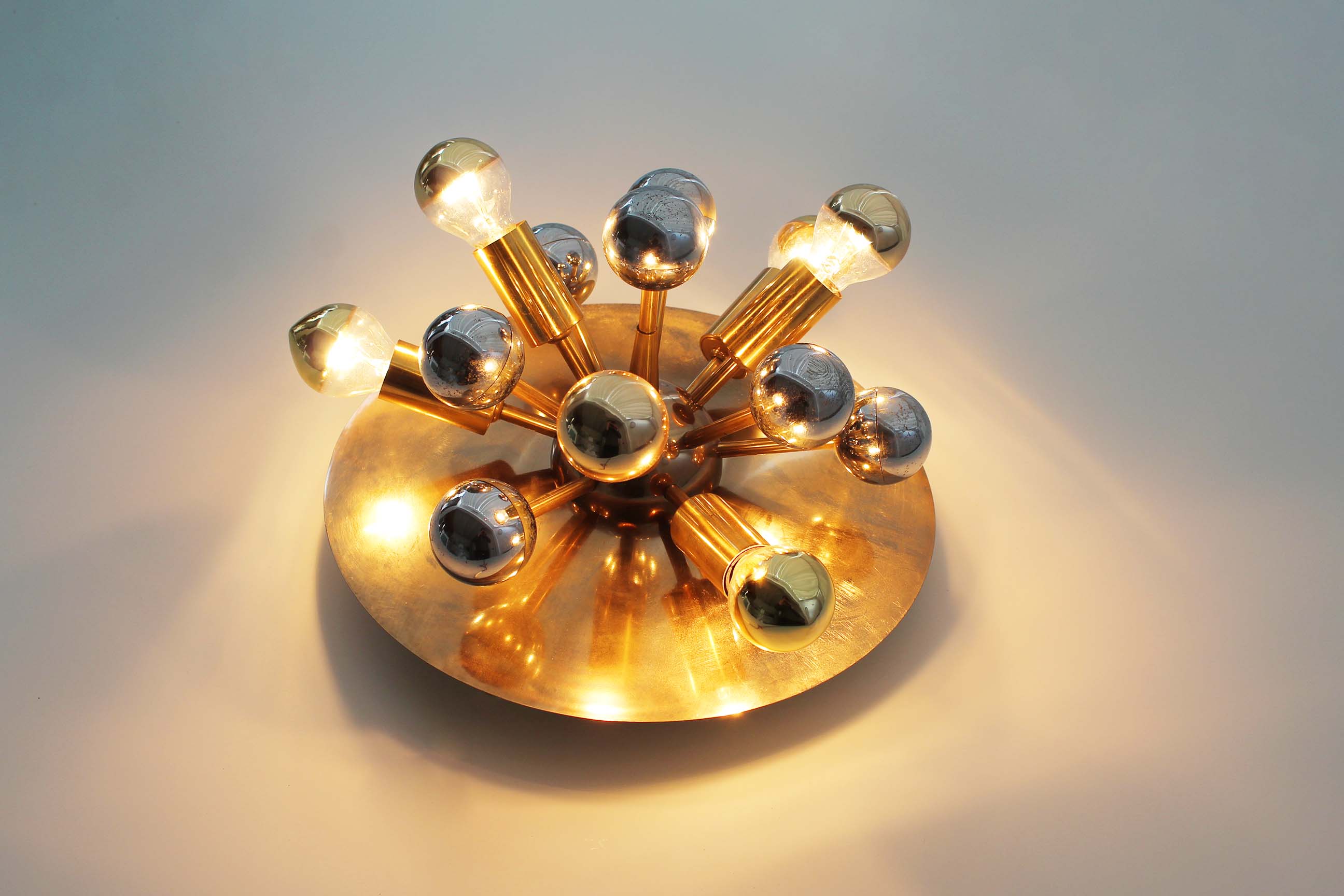 Brass sputnik wall light by Sa Boulanger