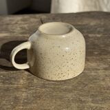 Set of 4 vintage speckled beige stoneware coffee cups.
