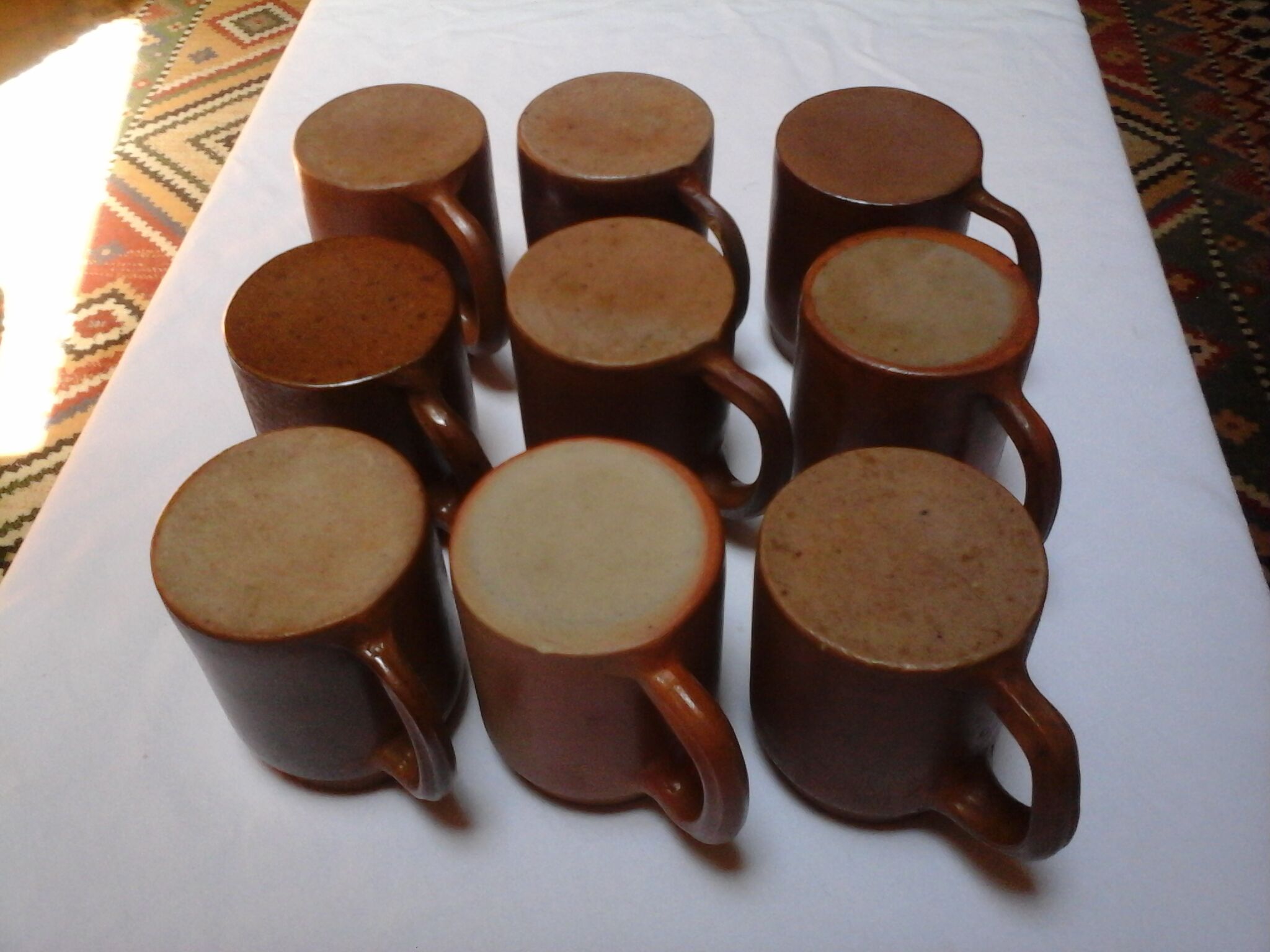Set of 9 sandstone mugs