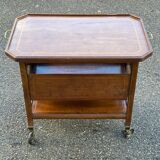Vintage retractable tea trolley on wheels