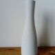 White ceramic vase with fine streaks