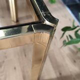 Table basse laiton plateau verre fumé