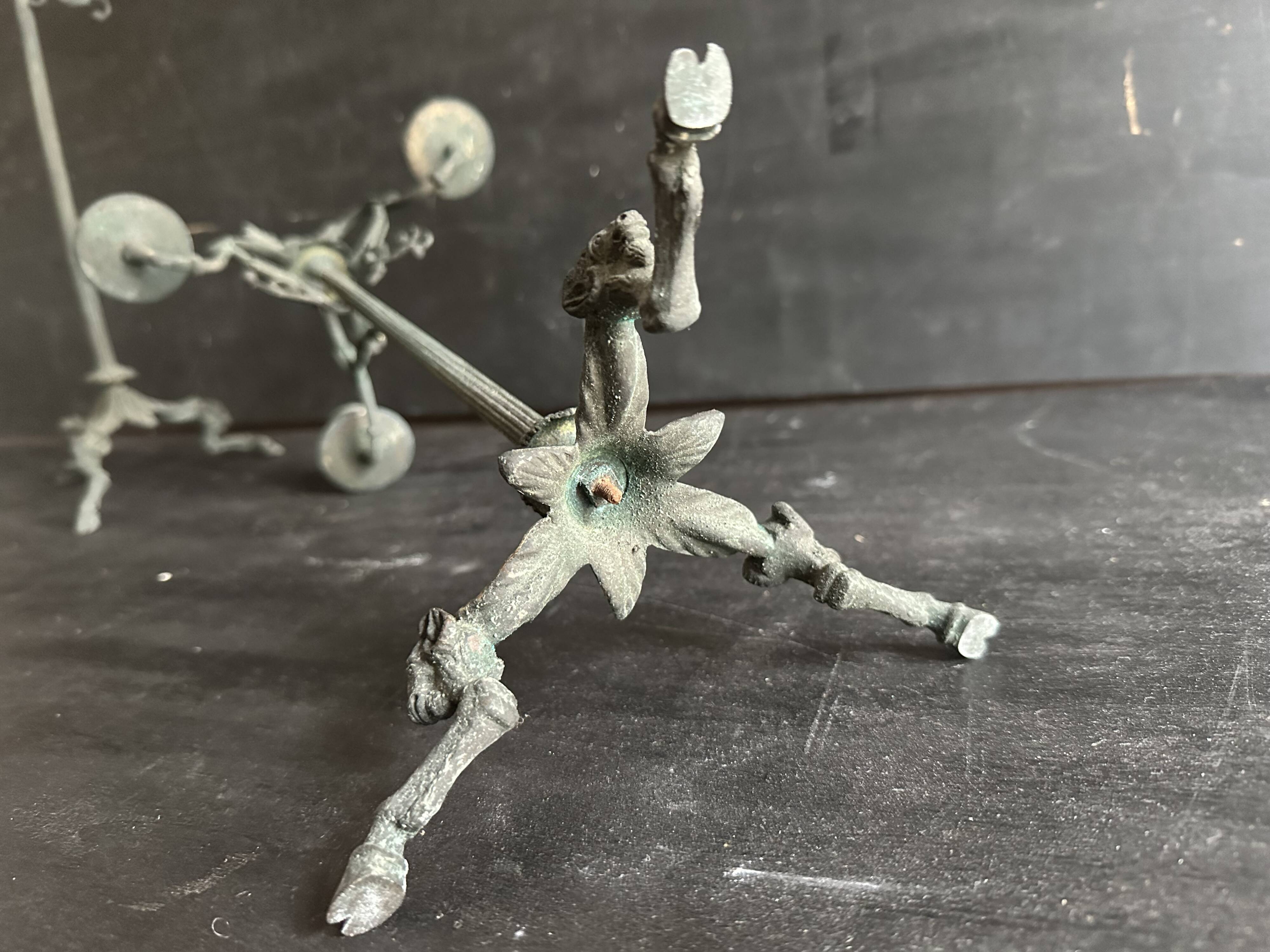 Pair of large Napoleon III candlesticks in patinated bronze