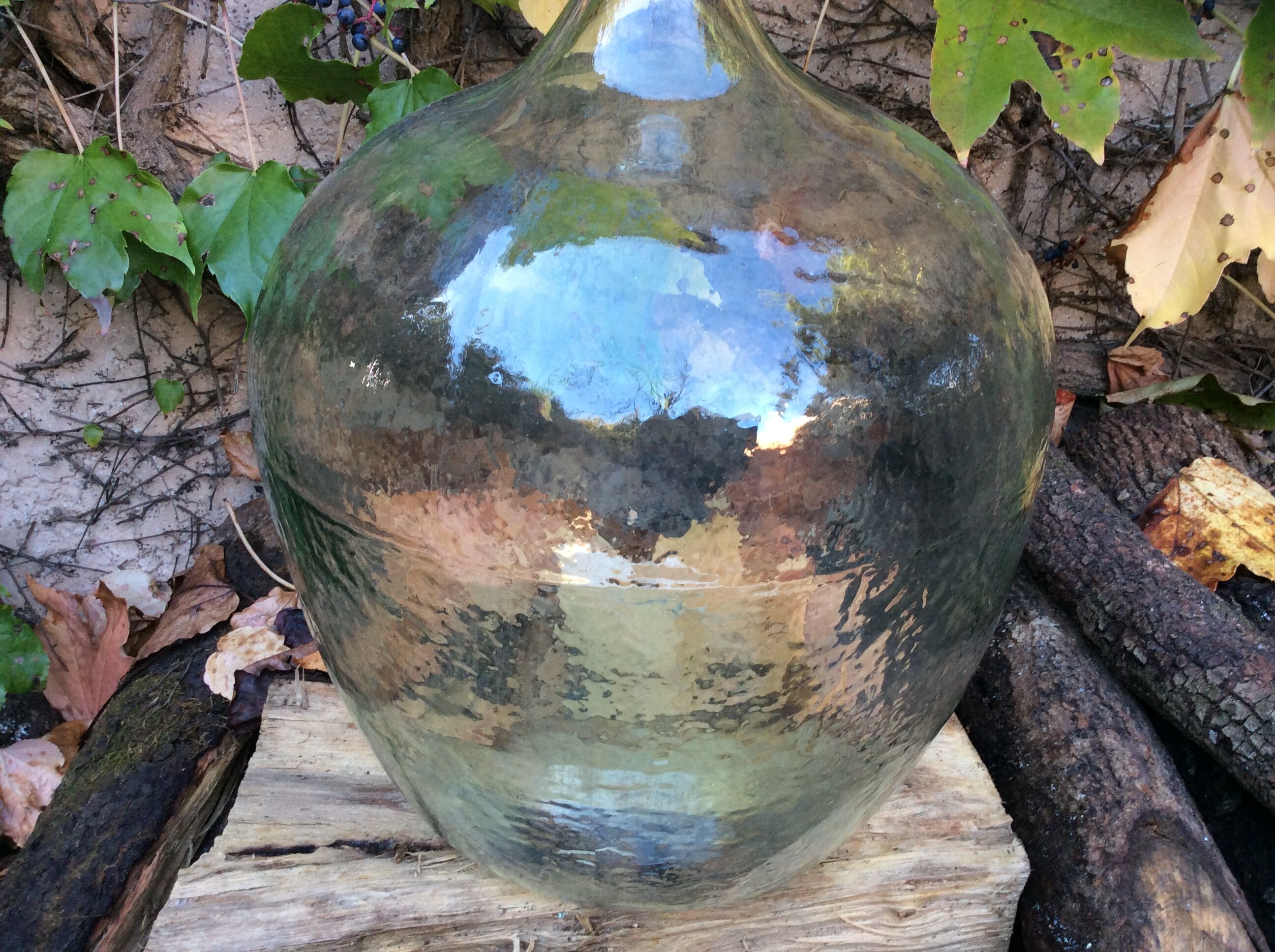 An old "Dame-jeanne" in blown glass, beginning of the nineteenth century