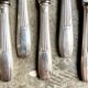 6 silver metal knives