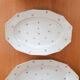 Oval dishes in floral porcelain and gold