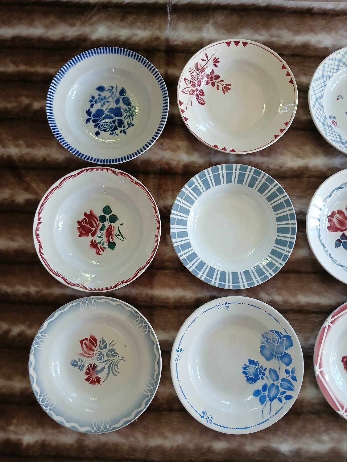 16 mismatched antique deep plates