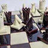 Original chess set in glazed terracotta, signed and numbered