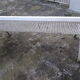 Old public wrought iron bench painted white - 50s