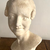 Plaster bust on marble stand