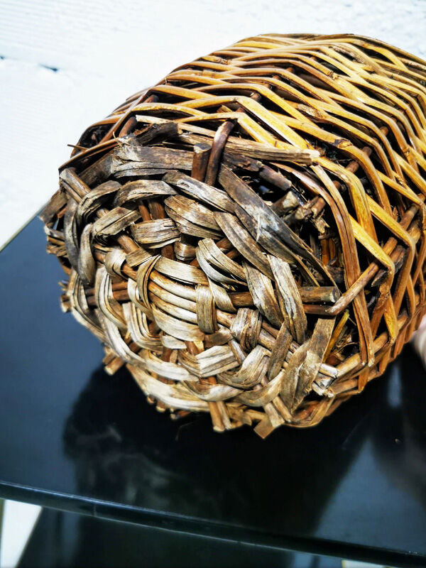 Demijohn dressed in wicker