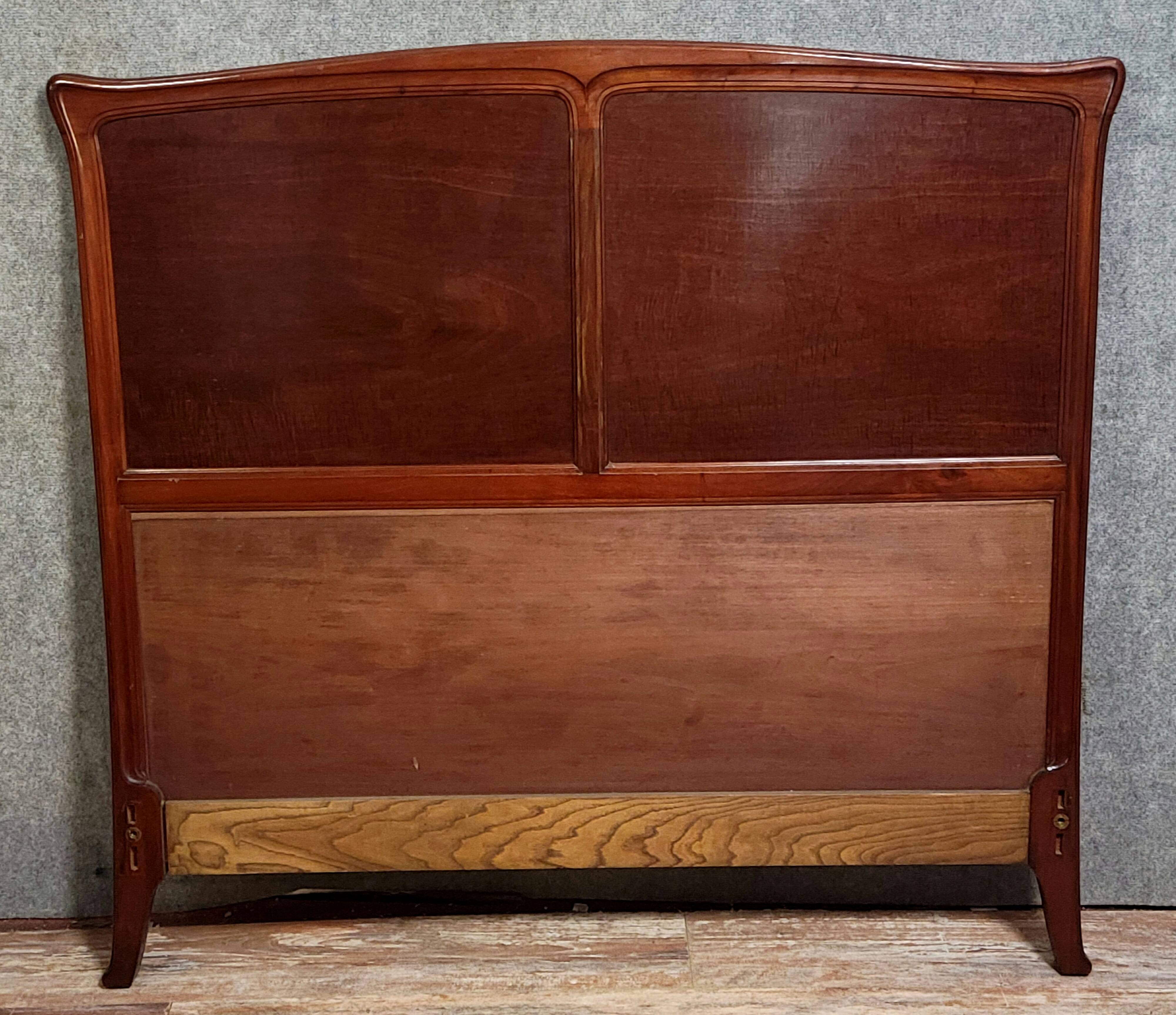 Nancy School: Art Nouveau style bed, characterized by its curved lines