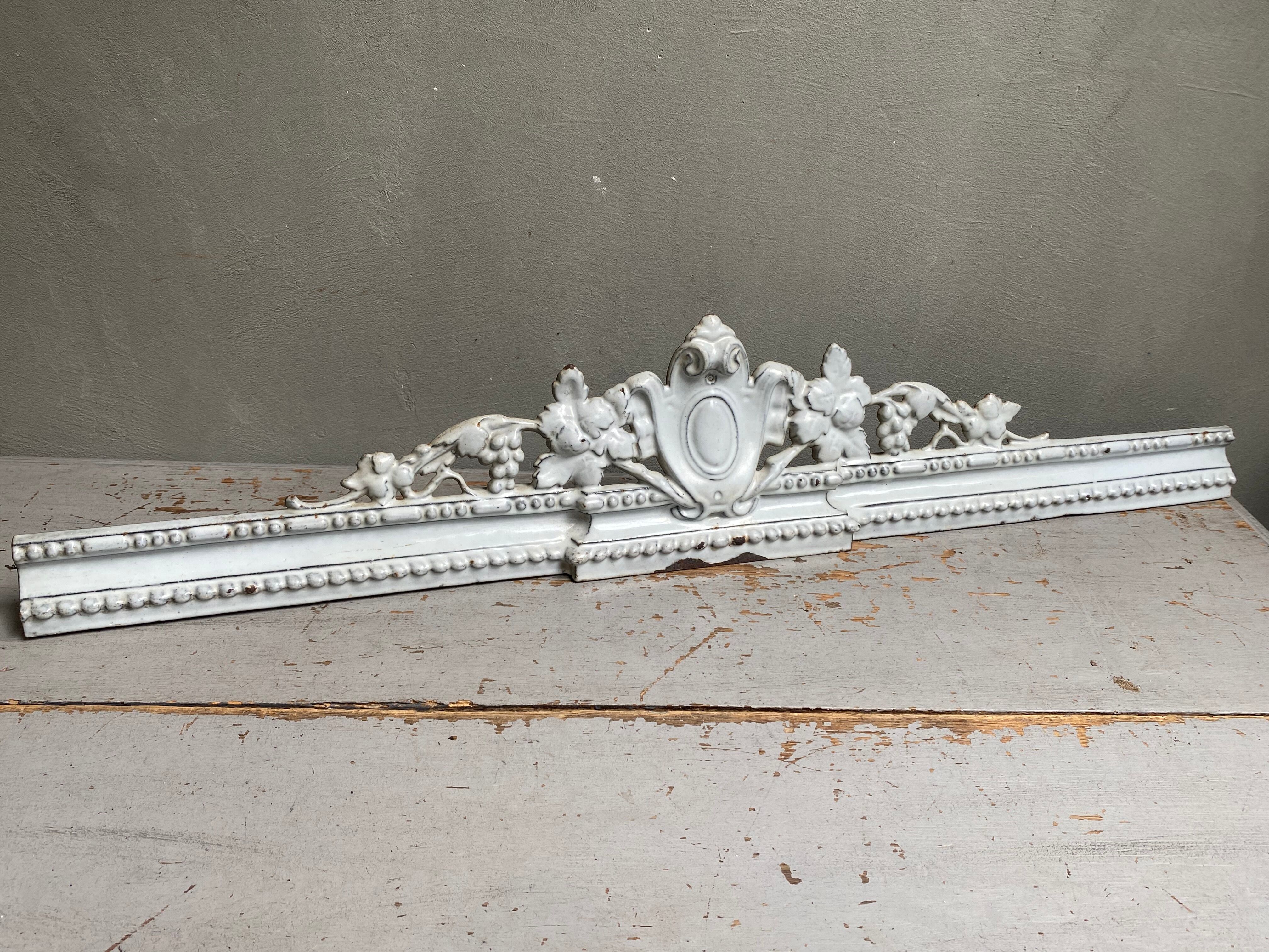 Enamelled cast iron pediment