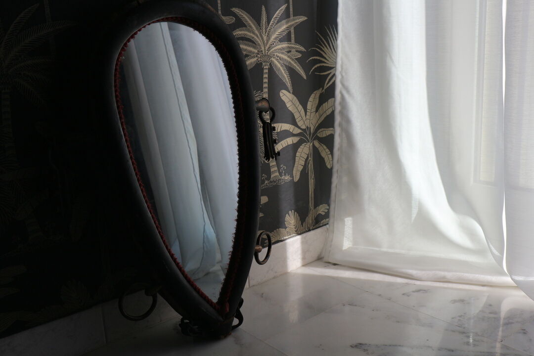 Vintage mirror made out of a horse collar