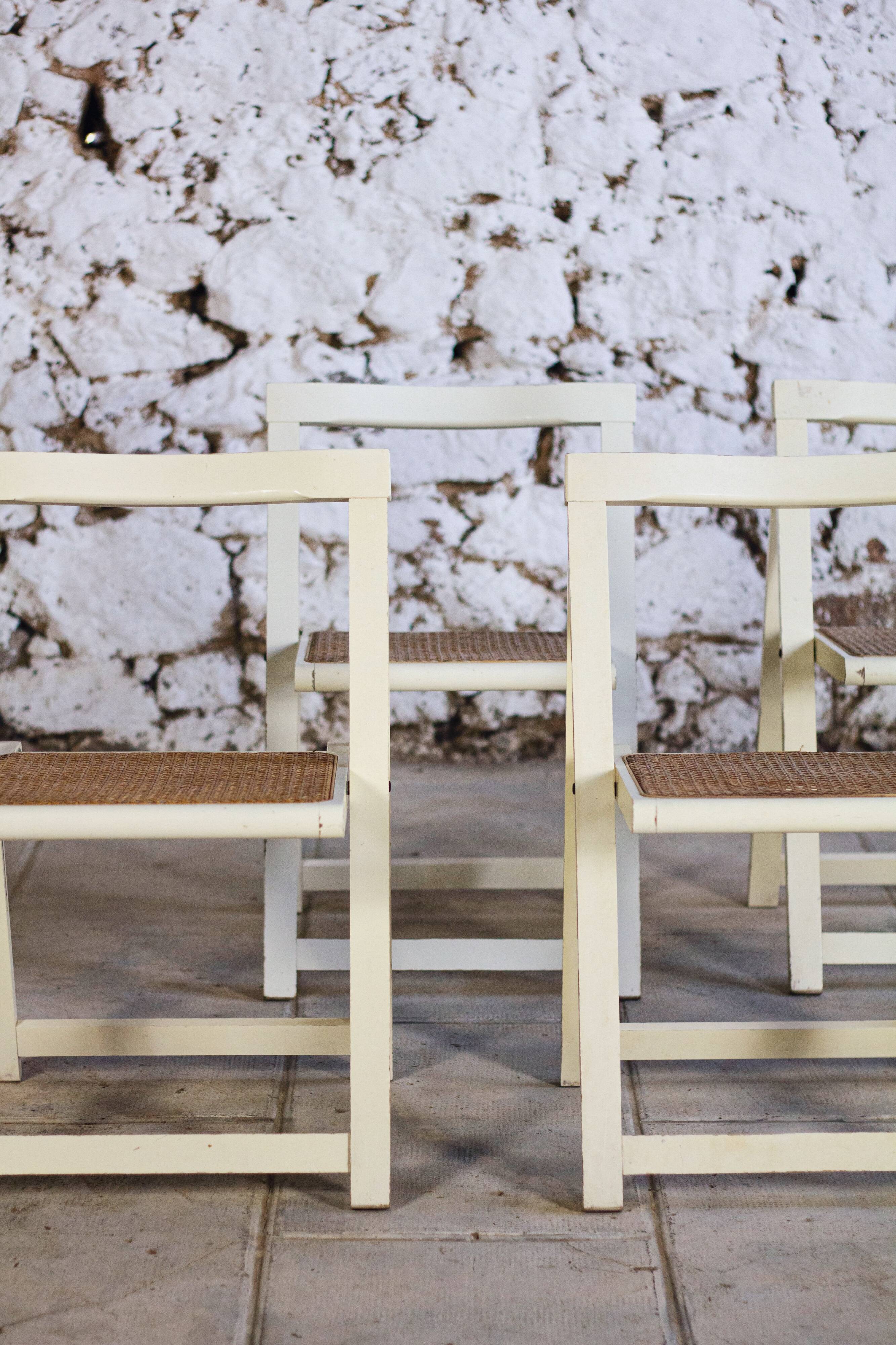 4 vintage folding cane chairs