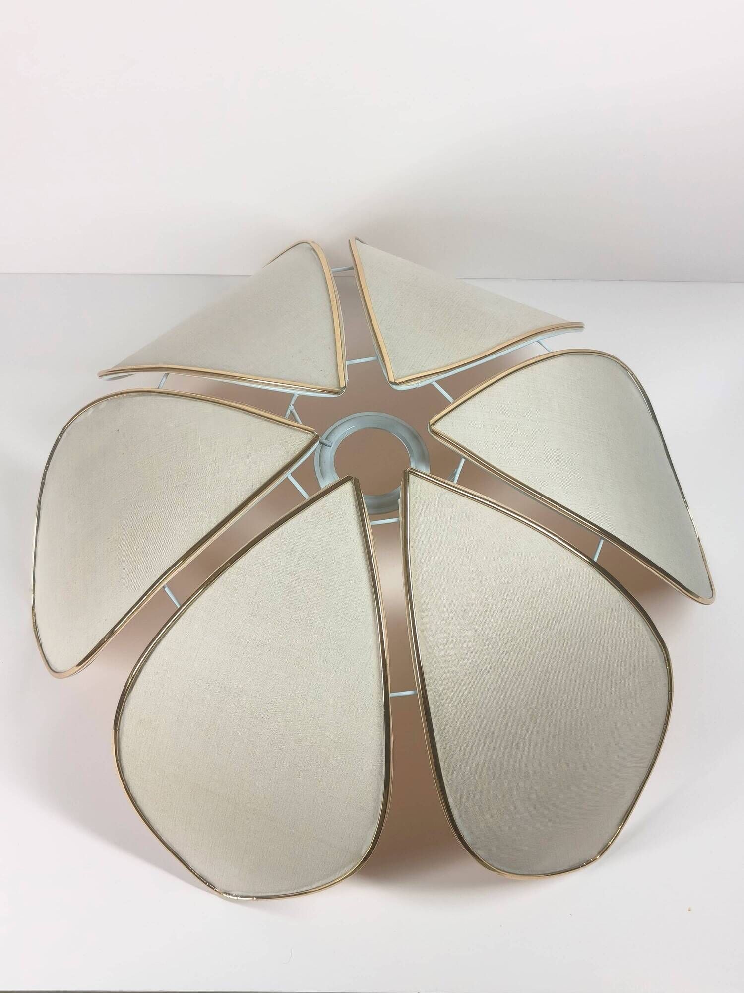 1970s ceiling light with floral design, light beige shade with gold finish.