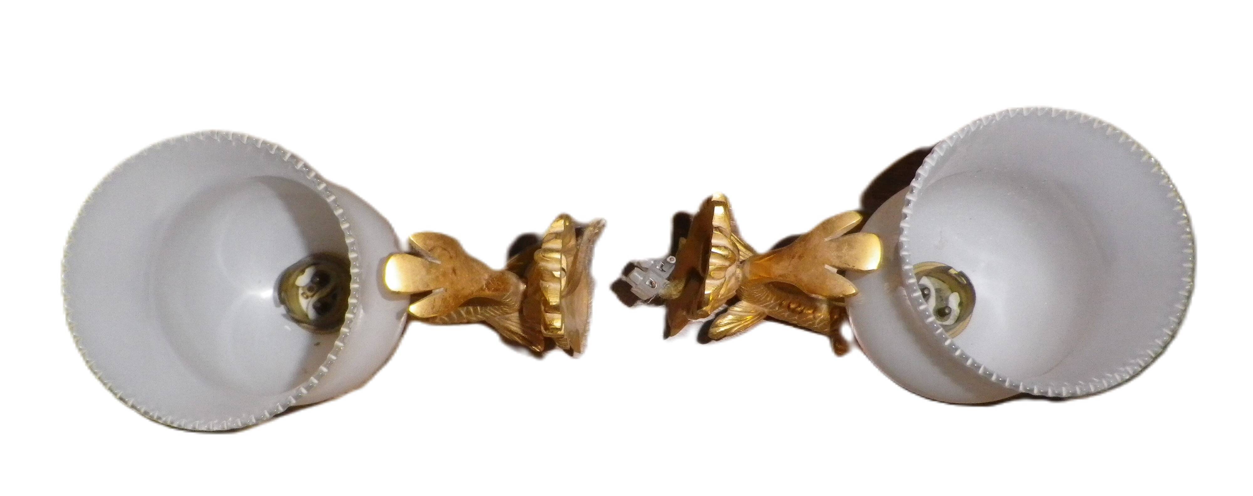 chandelier and its golden bronze brass wall lights